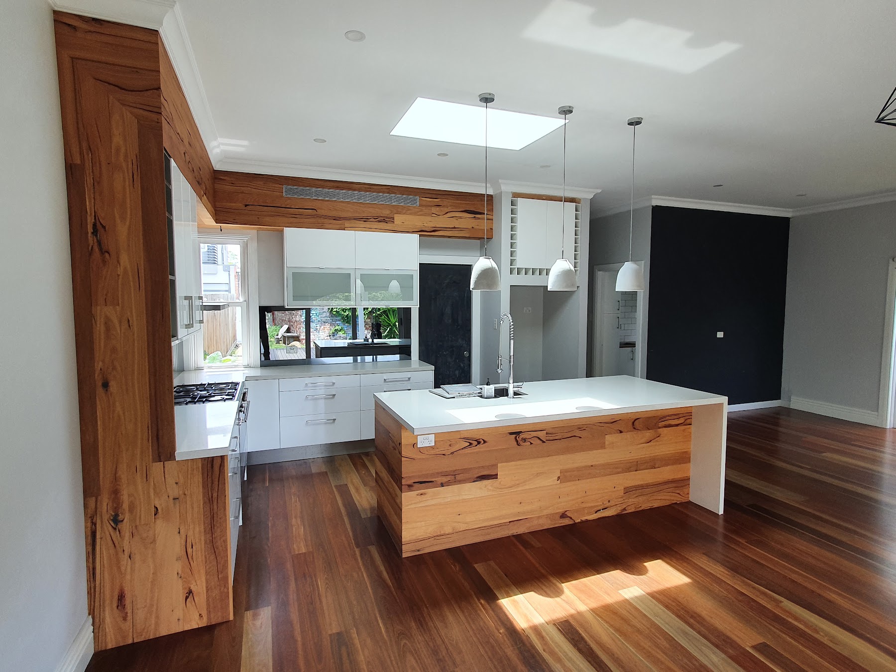 Melbourne Home Makeover kitchen with timber island, cabinetry and flooring